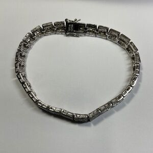 Sterling Silver Tennis Bracelet with clear stones. 7.5 inches long